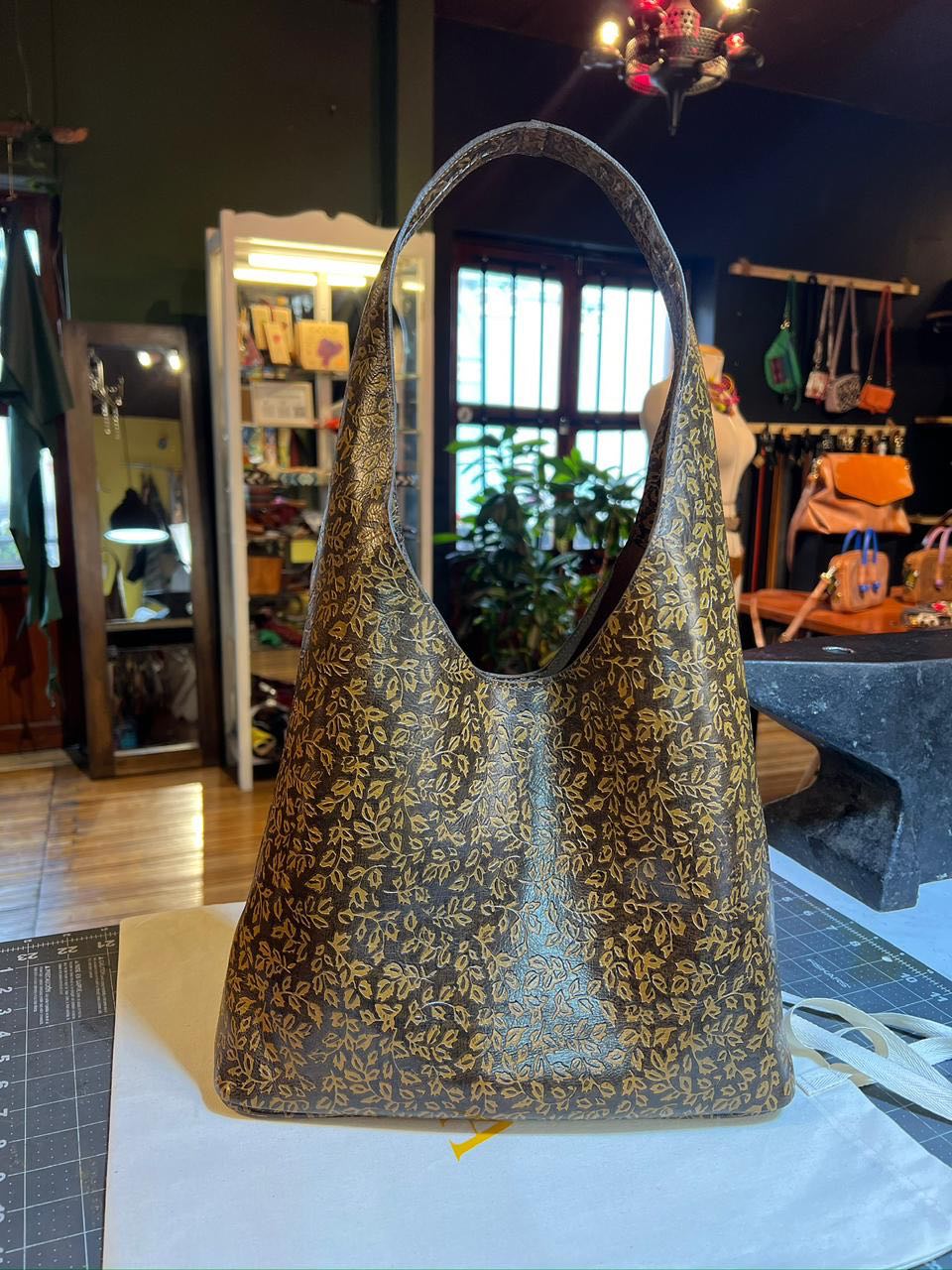 Auka handcrafted leather hobo bag in workshop
