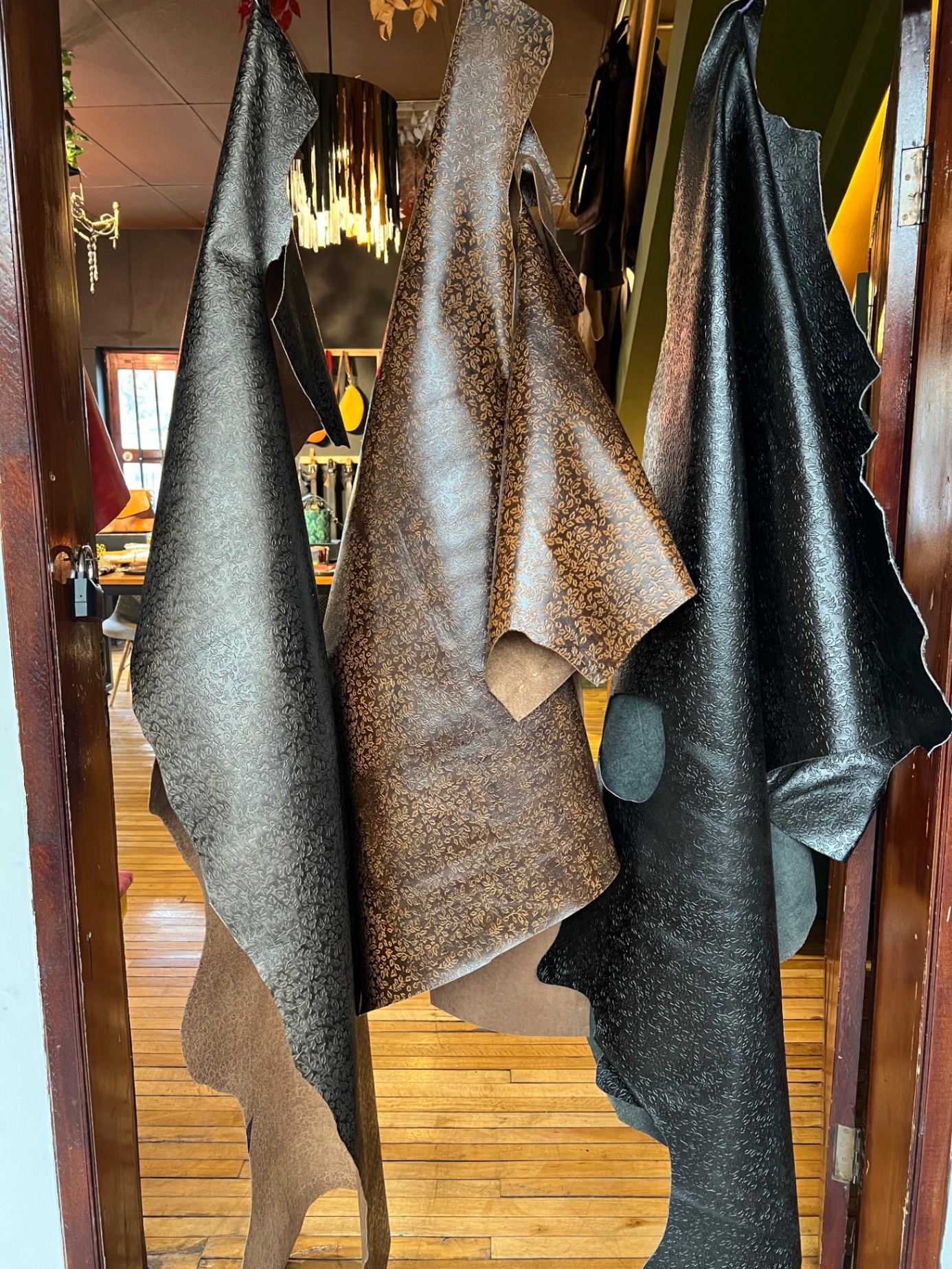Leather hides hanging in Auka atelier